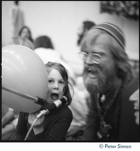 Bhagavan Das and child, appearing with Ram Dass at Sonoma State University
