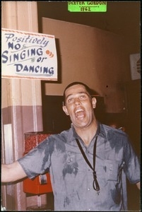 Dexter Gordon: horsing around, singing underneath a sign reading 'Positively no singing or dancing'