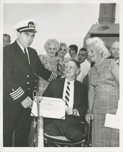 Dr. Stevenson shaking hands with the captain on the annual Hudson River cruise