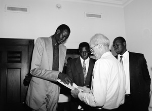 Congressman John W. Olver with Manute Bol (left) and other visitors