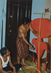 Kite Making: Soeun Tim makes adjustments to the kite's Bottom Wing, 1987