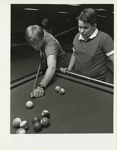 Erik Lecuyer and Tony Vasconcellos playing pool