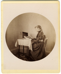 Abby F. Blanchard operating a card punching machine