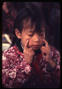 Hsiao Ying Primary School -- girl alone doing eye exercises