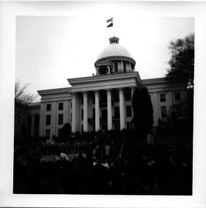 Marchers near the steps of the Mississippi capitol, in front of police cordon