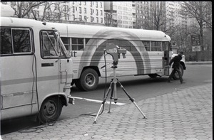 Camera set up in front of Free Spirit Press bus during interview by Channel 5 news