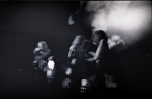 Jethro Tull in concert at the Springfield Civic Center: blurry image of Ian Anderson (left) and bandmates