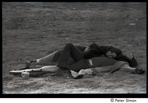 Verandah Porche, Rico (Richard Wizansky), and Jeff Warner lying in a heap on the grass