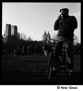 Man on a bicycle at the Be-In, Central Park, New York City