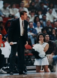 Providence College cheerleader Sue Ricci gives a silent warning to Coach Rick Barnes
