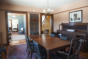 Dining room with table, chairs, and sideboard, at Naulakha, Rudyard Kipling's home from 1893-1896