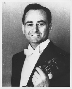 Julian Olevsky holding a violin