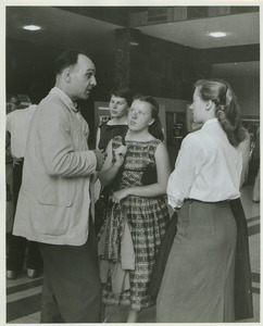 William F. Field chatting with students