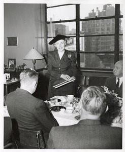 Mary Switzer poses at a meal at the Institute for the Crippled and Disabled