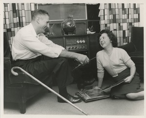 Dick Weir and woman with records