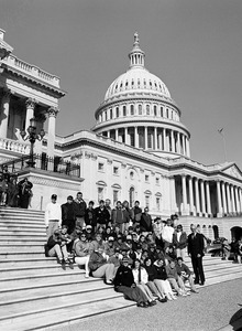 John Olver (right) and visitors, posed on the steps of the United States Capitol building