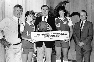 Mayor Raymond L. Flynn and Frank Finn with St. Clare High School basketball players Kelly Scherber and Mary Cawley