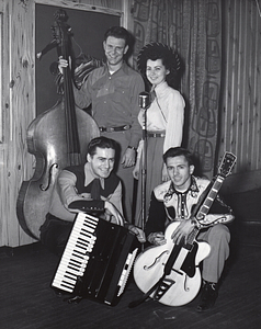 Quartet posing with instruments