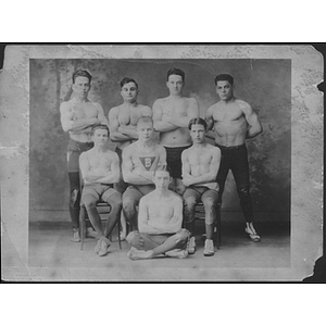 Men's wrestling team posing for group photo