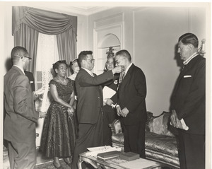 Bond with others receiving decoration at Liberian Embassy, Washington, D.C.