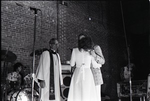 Wedding of Jim and Anne Baker: kissing the bride