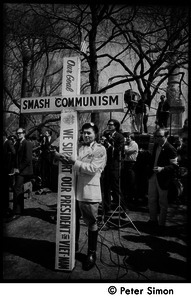 Resistance on the Boston Common: anti-Communist counter-demonstrator from Polish Freedom Fighters, Inc., holding cross reading ''Our goal, smash Communism: we support our president on Vietnam'