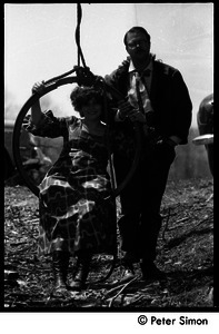 May Day at Packer Corners commune: Phoebe and Don McLean at the swing