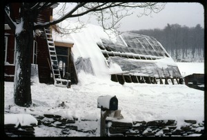 Greenhouse and front of house under snow, Montague Farm Commune