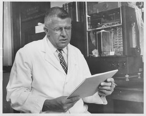 William B. Esselen working in laboratory