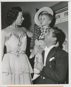 Jimmy Valentine and his partner, Rita, with young patient at Halloween party