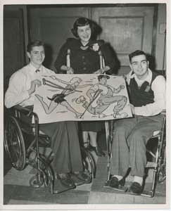 Clients holding poster at Sadie Hawkins Day dance