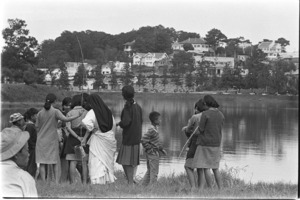 Catholic sisters and girl students fishing in the lake at La Grenouillerere; Tuyen Duc.