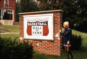 Student next to Basketball Hall of Fame Sign, 1973