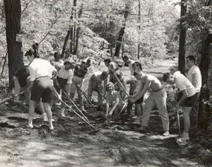 Campers raking at Freshman Camp (1953)