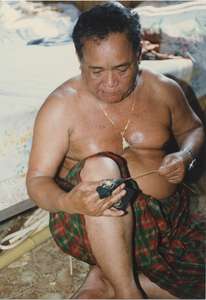 Basket Making: Em Yung shaves each bamboo splint, 1987