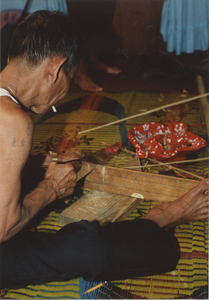 Kite Making: Tim Sao cuts the "M"-shaped Tail Piece, 1987