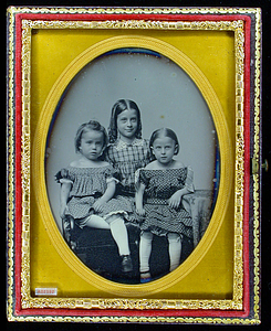 Portrait of three unidentified girls