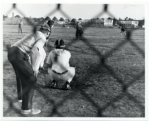 Unidentified men playing baseball