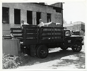 Unidentified men with a U.S. Air Force truck