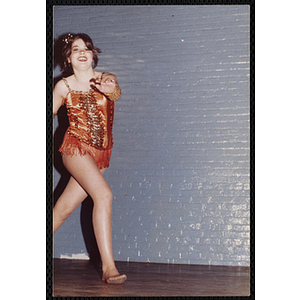 A girl from the Charlestown Boys and Girls Club posing in a dance costume