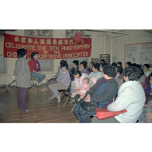 Speakers at a Chinese Progressive Association party