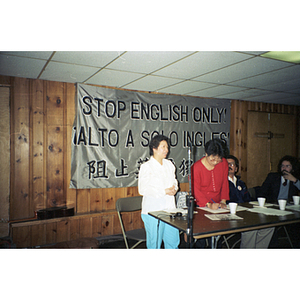 Speaker at a meeting with the Anglo-American, Hispanic, and Chinese communities to discuss bilingual education