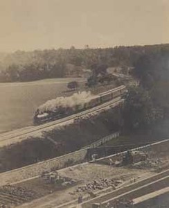 View of Boston & Albany passenger train from grounds of Keewaydin