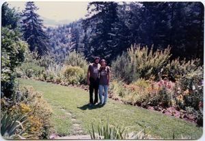 Mark and Sandi Sommer on front lawn, Salmon Creek house