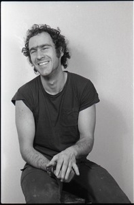 Studio portrait of Richard Safft, seated on a stool