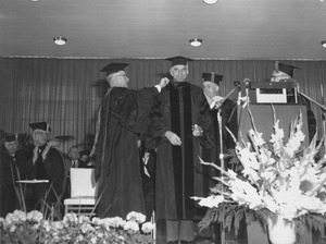 Glenn Seaborg at his hooding ceremony during the Centennial Charter Day convocation