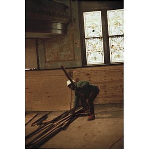 Construction worker in the former All Saints Lutheran Church.