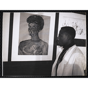 Arthur Fleming views the Boys' Clubs of Boston Tri-Club Art Exhibit at the Museum of Science