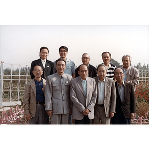 Ten Association members pose in a group during a visit to Hankou, China