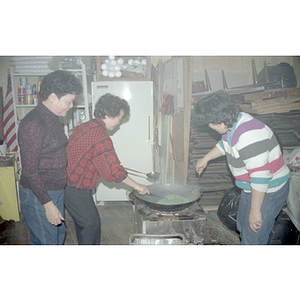 Cooks at a Chinese Progressive Association anniversary event